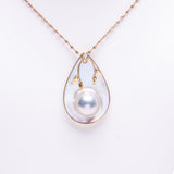 14 Kt Yellow Gold Pearl Shell and Diamond Pendant